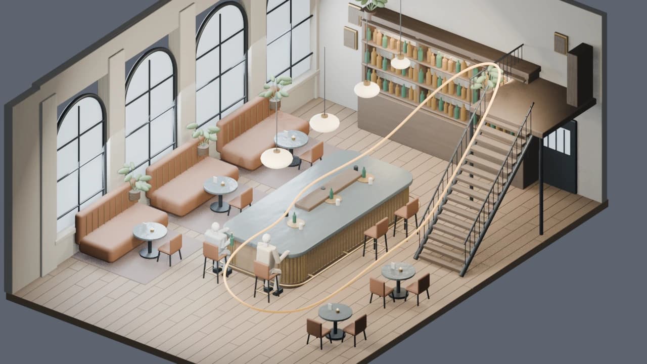 An open-sided 3D blockout showing the bar, tables, stairs and seating used to explore the room.